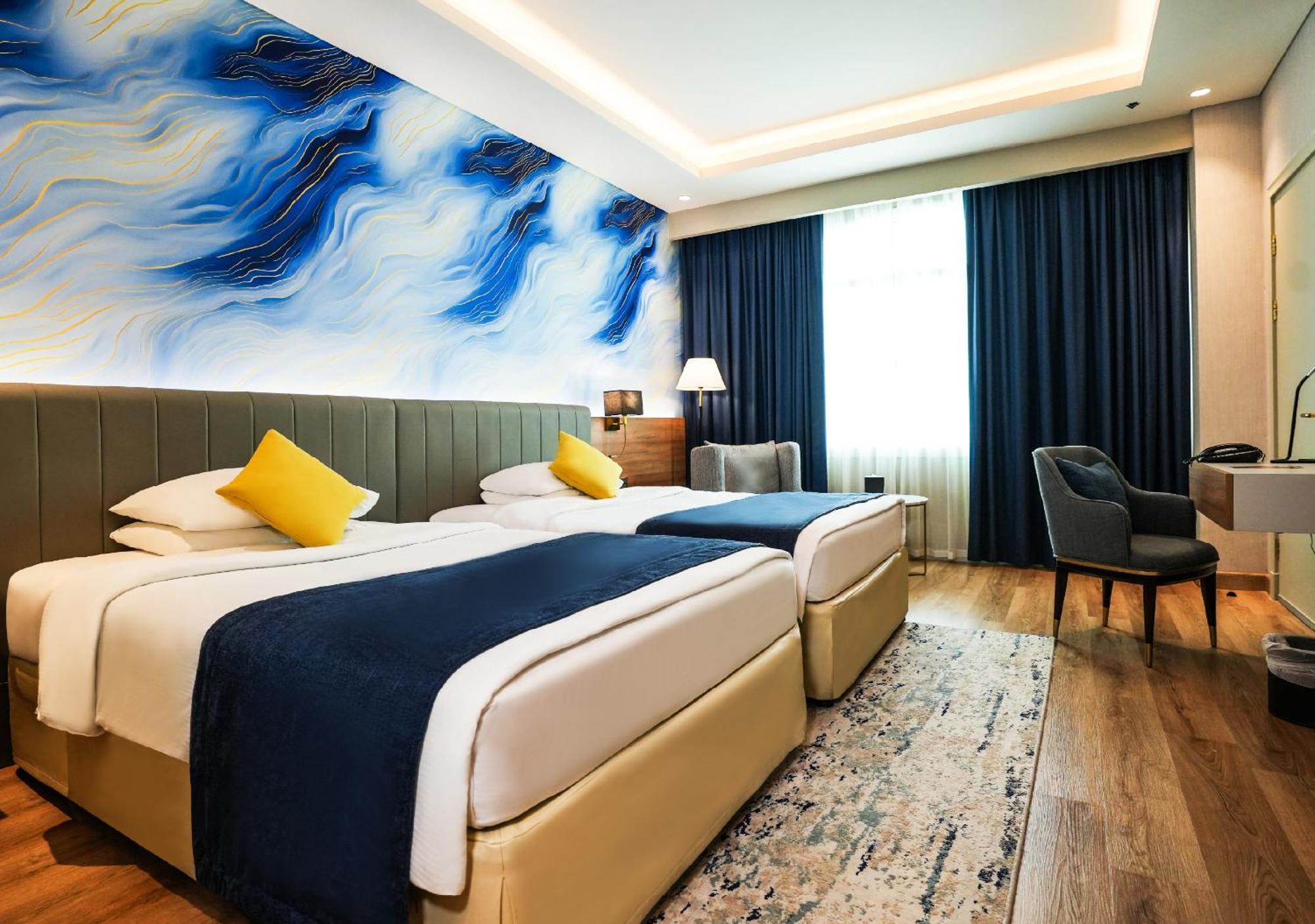 Moevenpick Grand Al Bustan Hotel Дубай Екстериор снимка